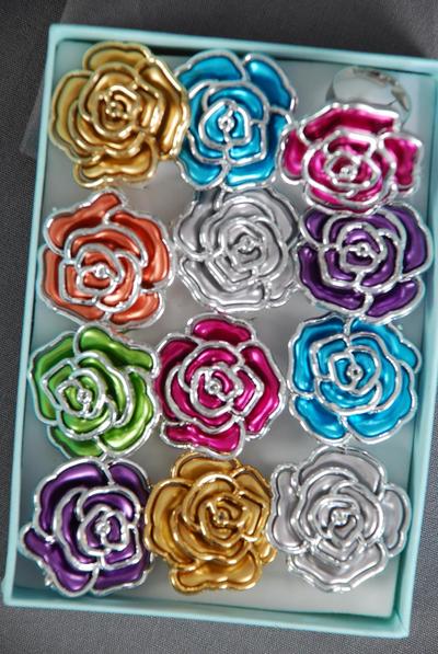 Ring Poly Rose Metallic Silver Trim Multi / 12 pcs = Dozen Adjustable , Rose Size - 1.25" Wide , 2 Gold , 2 Silver , 2 Fuchsia , 2 Blue , 2 Purple , 1 Lime , 1 Orange Color Asst