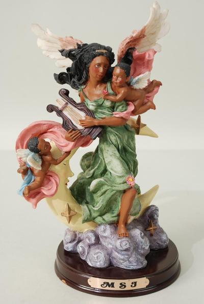 Figurine Angel Black With Moon w Wooden Base Green Dress / PC Green Dress , Size - 9.75" x 7.5" x 5.5" Wide , Color Gift Box & UPC Code 